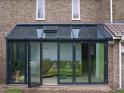 Contemporary lean-to with bi-folding doors