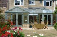 Bespoke green PVC-u conservatory