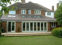 Extension with multi-fold doors