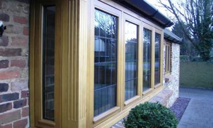 HARDWOOD BAY WINDOW WITH FLUTED
