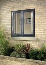 Black wood grain foiled aluminium window