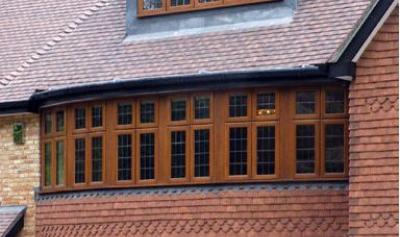 Large stained hardwood bay with equal sight lines and square lead